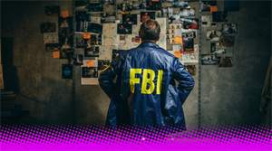 Mature FBI agent works on a case alone - stock photo