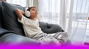 kid listening with headphones - stock photo