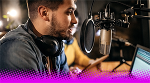 Man in front of podcast mic - stock photo 