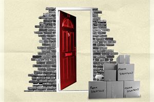 Open front door, a number of boxes in front with Media Strategy written on them