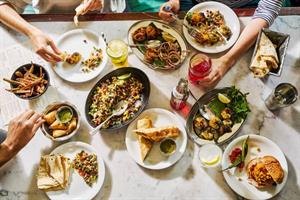 Plates of food at Dishoom Covent Garden