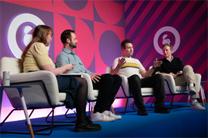 People chatting on panel discussion