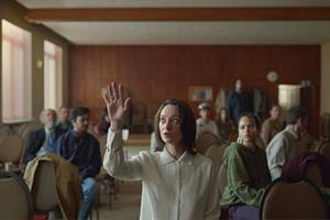 Woman raising her hand