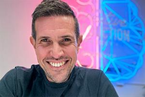 Headshot of Chris Rhodes