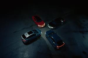 four Audi cars