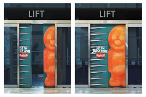 A lift with spikes and a Jelly Baby on the doors