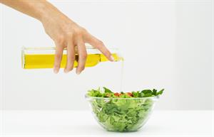 Salad dressing has entered the COVID-19 vaccine chat. (Image via Getty)