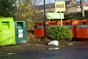 Rubbish dumped next to a recycling bin. Photograph: Geography Photos/Getty Images