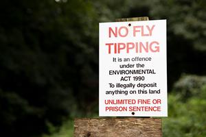 No fly-tipping warning sign. Photograph: Peter Carruthers/Getty Images
