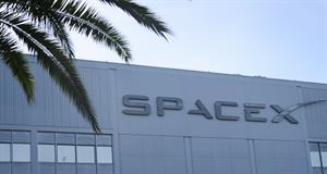 The SpaceX logo is displayed outside a Space Exploration Technologies Corp. facility in Hawthorne, California