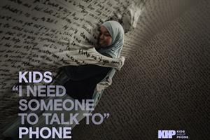 A girl hugging a page of text with the blurb 