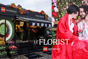 A Lego Botanicals stall and a couple with a Lego flower