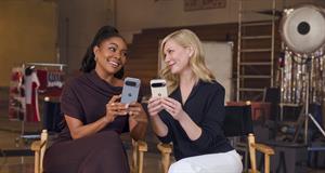 Gabrielle Union and Kirsten Dunst holding Google smart phones