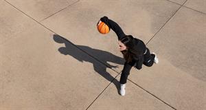 Caitlin Clark dribbling a basketball 