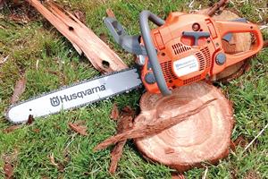 Husqvarna 450 chainsaw - image: HW