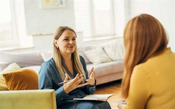 CBT session involving a woman and a counsellor