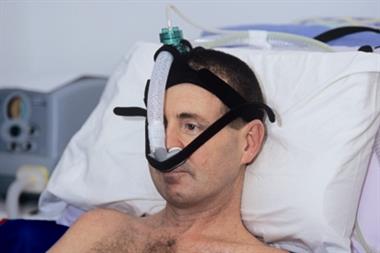 Patient with motor neurone disease on a ventilator (Photograph: SPL)