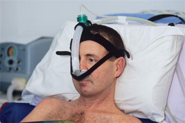 Patient with motor neurone disease on a ventilator (Photo: SPL)