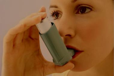 Asthma inhaler use (Photograph: GAVIN KINGCOME/SPL)