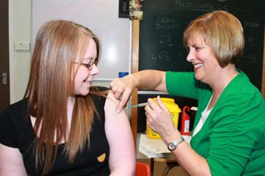Girl receives HPV jab (Photograph: Consolidated Scotland)