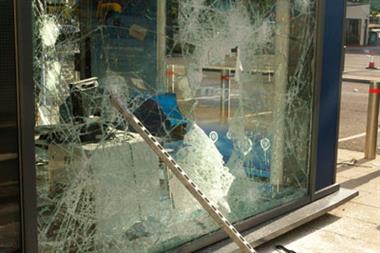 Rioting in London has led to shop fronts being smashed (above) and GP practices being broken into (Photograph: Rexfeatures)