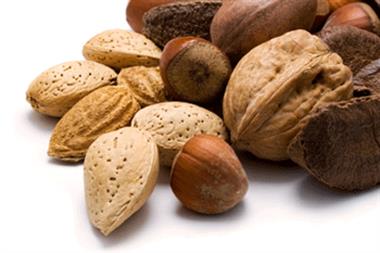 Researchers say a handful of nuts a day can improve blood cholesterol levels (Photograph: Istock)