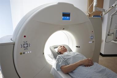 Man entering CT scanner