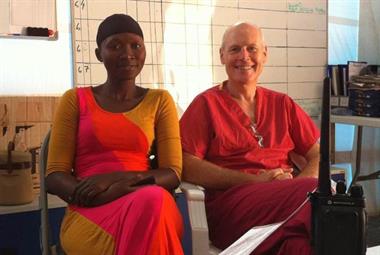 Dr Charles Heatley with Agnes, a community health officer at the Kerrytown Ebola Treatment Centre