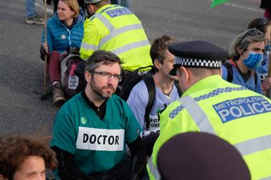 Dr Chris Newman during the Doctors for Extinction Rebellion protest on Lambeth Bridge