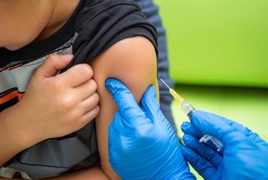 Child receiving an MMR vaccine