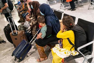 Afghan refugees arriving at Heathrow airport after being evacuated from Afghanistan following the British and US withdrawal in 2021