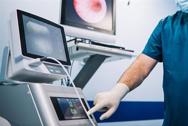 Doctor prepraring machines for a colonoscopy