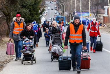 Refugees head for the border in Uzhhorod, Ukraine
