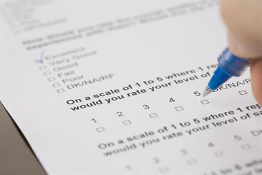 Pen ticking box on satisfaction survey