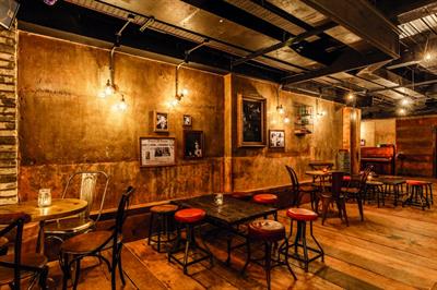 Reclaimed brickwork and flooring is reminiscent of the 1920s