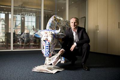 Bullish Auckland: Pictured here with a cow made from Metro newspapers