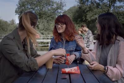 A still from the Maltesers 'New Boyfriend' ad featuring three women talking about their love life