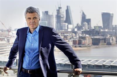 Photo of Mark Read in front a London skyline