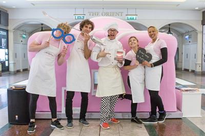 A team of Mr Kipling bakers manned the oversized cake 