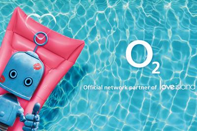 O2 mascot Bubl lounges on a lilo in the Love Island pool