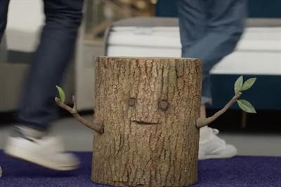 Screenshot from the 'Sleep like Log' campaign featuring a log as a spokesperson