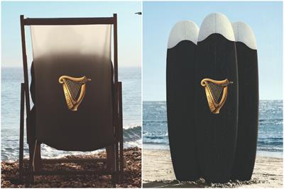 Person in deck chair and cluster of surfboards resembling pints of Guinness