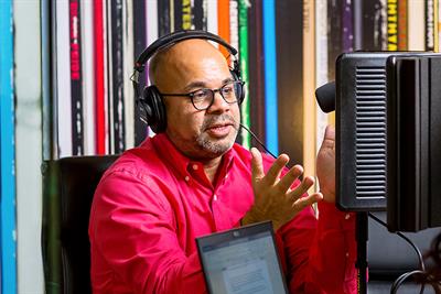 Ajit Kara, CEO, Tag Americas, in a podcast studio