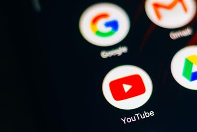YouTube app is shown on smartphone screen alongside Google, Gmail and Google Drive apps