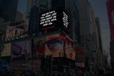 Star Wars billboard in Times Square displaying Galactic Basic writing