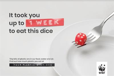 Fork holding plastic dice with caption "It took you up to 1 week to eat this dice"