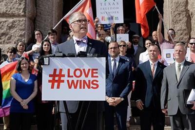 Same-sex marriage supporters celebrate the U.S. Supreme Court ruling. Pic credit: PA Photos.