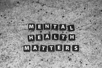 Scrabble pieces spelling out "Mental Health Matters"