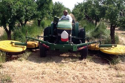Reason Farms: Micron Spraydome units used for weed control in California orchards - image: Micron Group