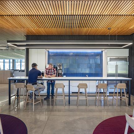 WRNS Studio renovation doubles century-old Okland Construction HQ
